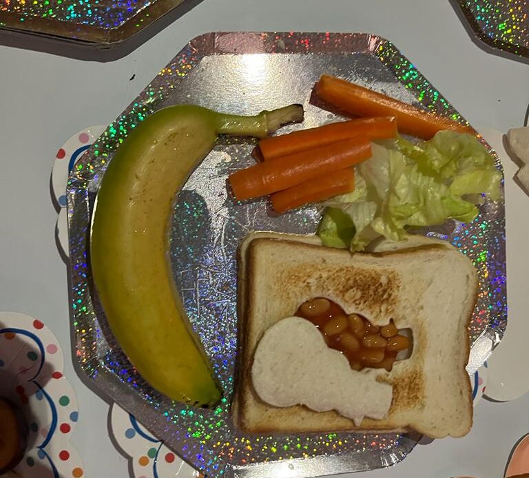 Snowman toast with banana and carrots