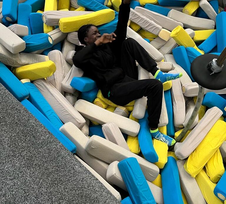 Child playing in foam pit